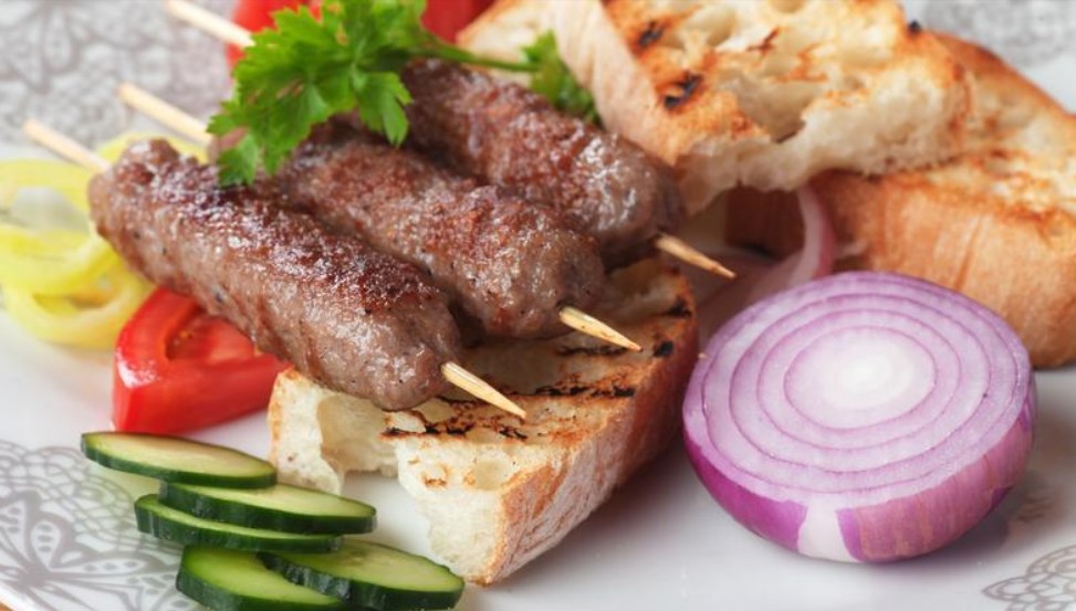 Šiš-Ćevapi - spicy grilled on wooden sticks