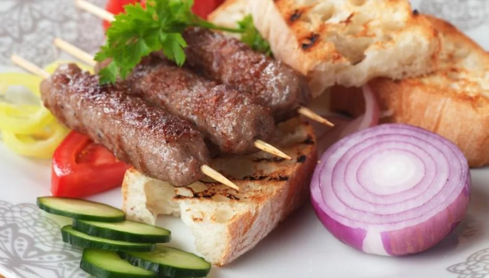 Šiš-Ćevapi - spicy grilled on wooden sticks